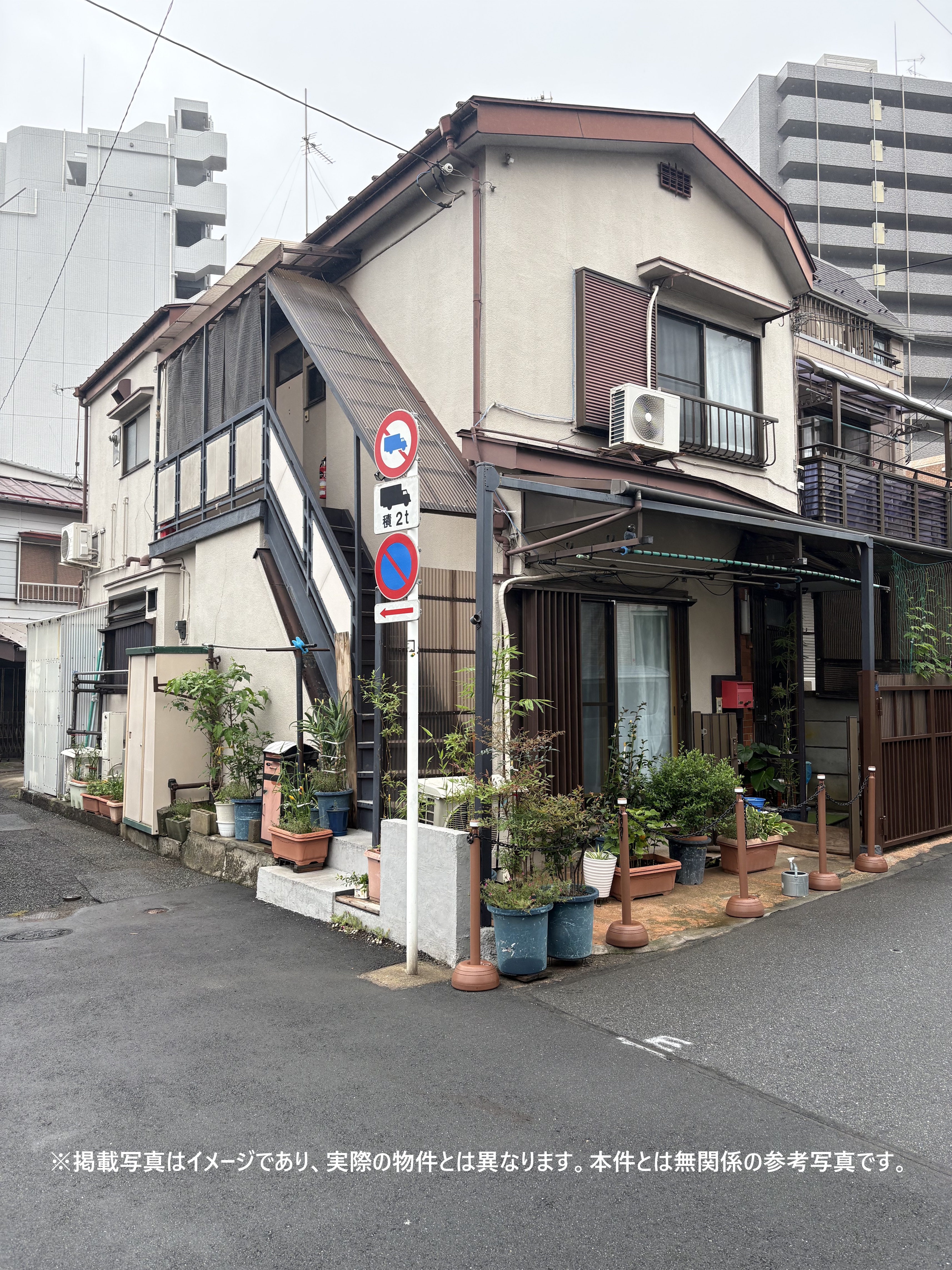 遠方相続人の荒川区東尾久一棟マンション借地権を買取、地主との交渉で最良条件